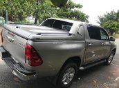 Cần bán xe Toyota Hilux 3.0G 4x4 AT đời 2015, màu bạc, xe nhập, 660tr