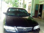 Cần bán gấp Mazda 626 đời 2002, màu đen