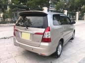 Cần bán xe Toyota Innova 2014 số sàn, màu vàng cát