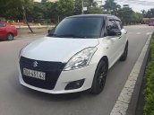 Cần bán xe Suzuki Swift 1.4AT đời 2014, màu trắng số tự động