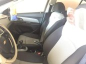 Bán ô tô Chevrolet Cruze LT đời 2016, màu trắng số sàn, giá tốt