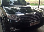 Chính chủ bán xe Toyota Fortuner 2.4 MT đời 2015, màu đen