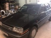 Bán Toyota Carina đời 1986, màu đen xe gia đình