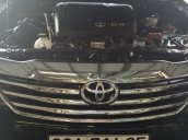 Chính chủ bán xe Toyota Fortuner 2.4 MT đời 2015, màu đen