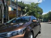 Cần bán lại xe Toyota Corolla altis năm sản xuất 2016, màu nâu số tự động