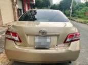 Bán xe Toyota Camry Le đời 2010, màu vàng cát