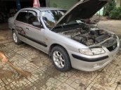 Cần bán xe Mazda 626 sản xuất năm 2001, màu bạc xe gia đình