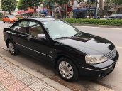 Bán lại xe Ford Laser GHIA năm sản xuất 2003, màu đen số tự động