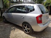 Gia đình bán Kia Carens SX 2010, màu bạc số tự động