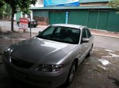 Cần bán xe Mazda 626 năm 2004, màu bạc