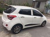 Bán xe Hyundai Grand i10 1.0 AT năm sản xuất 2015, màu trắng chính chủ