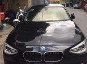 Bán em BMW 116i đời 2013 màu đen, số tự động, 8 cấp