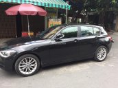 Bán em BMW 116i đời 2013 màu đen, số tự động, 8 cấp