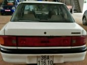 Bán ô tô Mazda 323 đời 1994, màu trắng