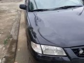 Cần bán xe Mazda 626 2003, màu đen 