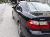 Cần bán xe Mazda 626 2003, màu đen 