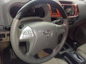 Bán ô tô Toyota Fortuner V 2013, màu bạc số tự động, giá 710tr