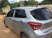 Bán ô tô Hyundai Grand i10 đời 2015, màu bạc xe gia đình