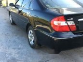 Cần bán lại xe Toyota Camry đời 2003, màu đen