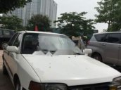 Cần bán lại xe Mazda 323 đời 1996, màu trắng, 49tr