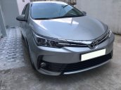 Cần bán gấp xe Toyota Corolla Altis 1.8E màu bạc, số tự động, đời 2017