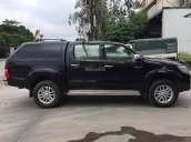 Cần bán gấp Toyota Hilux MT đời 2014, màu đen, xe nhập còn mới