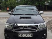 Cần bán gấp Toyota Hilux MT đời 2014, màu đen, xe nhập còn mới