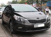 Cần bán lại xe Kia K3 1.6 MT năm 2015, màu nâu