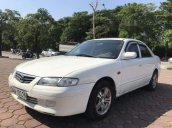 Cần bán xe Mazda 626 sản xuất năm 2001, màu trắng xe gia đình, 125tr