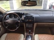 Cần bán lại xe Daewoo Magnus 2004, màu đen giá cạnh tranh