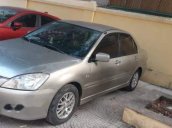 Cần bán lại xe Mitsubishi Lancer 2003 xe gia đình