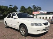 Cần bán xe Mazda 626 sản xuất năm 2001, màu trắng xe gia đình, 125tr