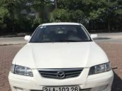 Cần bán xe Mazda 626 sản xuất năm 2001, màu trắng xe gia đình, 125tr