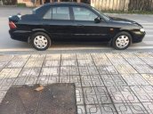 Cần bán Mazda 626 đời 2001, màu đen xe gia đình