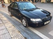 Cần bán Mazda 626 đời 2001, màu đen xe gia đình