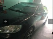 Cần bán xe Toyota Corolla đời 2004, màu đen còn mới