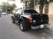 Cần bán lại xe Mitsubishi Triton đời 2013, màu đen