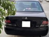 Cần bán gấp Mitsubishi Lancer GLX 1.6 AT đời 2004, màu đen chính chủ