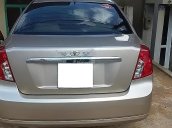 Gia đình bán Daewoo Lacetti EX đời 2011, màu vàng