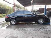 Cần bán xe Ford Mondeo đời 2004, màu đen, giá chỉ 250 triệu