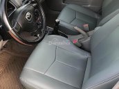 Bán Mazda 323 năm 2004, màu đen xe gia đình