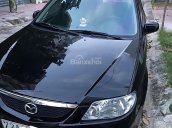 Bán Mazda 323 năm 2004, màu đen xe gia đình