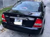 Bán Mazda 323 năm 2004, màu đen xe gia đình