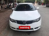 Cần bán Kia Cerato 1.6 AT đời 2010, màu trắng, nhập khẩu 