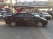 Cần bán Toyota Corolla altis 1.8AT đời 2014, màu đen