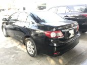 Cần bán Toyota Corolla altis 1.8G đời 2014, màu đen