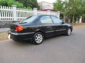 Bán Kia Spectra đời 2005, màu đen, giá 144tr