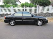 Bán Kia Spectra đời 2005, màu đen, giá 144tr