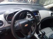 Cần bán gấp Chevrolet Cruze số sàn sản xuất 2014, màu trắng xe gia đình, giá tốt 310 triệu