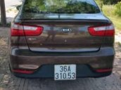 Cần bán gấp Kia Rio MT 2014, màu nâu, xe đẹp, không đâm đụng không thuỷ kích